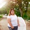 Asian beautiful fat woman with umbrella in the garden.