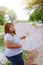 Asian beautiful fat woman with umbrella in the garden.