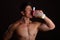 Asian Body Builder Drinking a Protein Shake