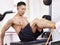 Asian bodybuilder exercising in gym