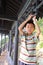 Asian boy in chinese traditional corridor