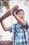 Asian boy climbing on rope ladder made of wood.Travel and advent