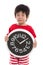 Asian boy crying and holding clock