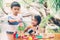 Asian boy and gril playing wooden block toy on table for creative and development with enjoy.