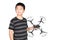 Asian boy holding hexacopter drone or quadrocopter toy in hand,