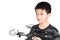 Asian boy holding hexacopter drone or quadrocopter toy in hand,