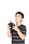 Asian boy holding hexacopter drone and radio remote control hand