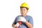 An Asian boy is a mechanic wearing a yellow helmet.