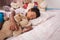 Asian boy sleep with teddy bear