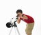 Asian boy with a telescope