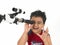 Asian boy with telescope