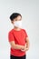 Asian boy wearing mouth mask against air Pollution atmosphere for protect from flu or disease healthcare concept