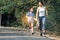 Asian Boys and Girls Fitness Outdoor Concept Selective boy running with a woman`s hand as a jogging trainer Running is a sport