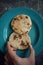 Asian bread in hand of hungry person. Indian roti food made from coconut and wheet, good for breakfast.