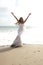 Asian Bride Celebrating Her Joy on the Beach