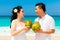 Asian bride and groom on a tropical beach. Wedding and honeymoon