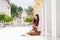 Asian buddhist woman reading Sanskrit ancient Tripitaka book of Lord Buddha dhamma and