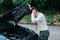 Asian businessman broken car engine breakdown, Streesed emotion, Accident emergency on the road