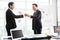 Asian businessmen fist bump for the teamwork of business mergers and acquisitions for successful negotiation. Two businessmen.