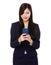 Asian businesswoman check email on cellphone