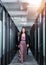 Asian businesswoman with colleague confident walking in corridor at office