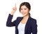 Asian businesswoman with finger pointing upwards