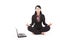 Asian businesswoman meditating