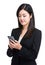 Asian businesswoman send message on celllphone