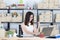 Asian businesswoman smiling and happy Successfully received orders from online customers in the homeoffice. Concept for home base