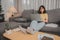 Asian businesswoman working online alone at home. Woman lifestyle in living room. Social distancing
