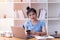 Asian businesswomen used smartphone in the office