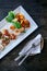 Asian canapes appetizer - Smoked salmon, maki, larb, tuna tartar