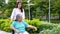 Asian careful caregiver or nurse taking care of the patient in a wheelchair.  Concept of happy retirement with care from a