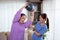 Asian caregiver woman or nurse training senior woman lifting sport ball with hands for exercise while physical therapy.