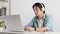 Asian Casual Businessman or Freelancer Wear Headphone Listen to Music