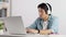 Asian Casual Businessman or Freelancer Wear Headphone Work from Home with Laptop