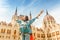 Asian casual woman student enjoying great view of the Parliament building in Budapest city, travel in Europe concept