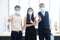 Asian and Caucasian businesspeople teamwork is wearing mask Preventing for Covid 19 virus is new normal and lifestyle of personnel