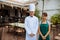 Asian chef and a waitress