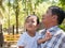 Asian child boy and grandfather smiling together outdoor