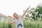 Asian child boy are playing Badminton outdoor in sunset