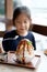 Asian Child Enjoys Eating Korean Patbingsu or Bingsu, Shave Ice