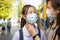 Asian child girl wearing medical mask in public area at risk of disease,people prevent infection from spreading of Corona virus in
