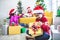 Asian child girls surprise with gift and helping to decorate together for celebrate in Christmas festival