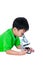 Asian child observed through a microscope biological preparation