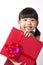 Asian child with red gift box