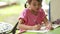 Asian children practice to drawing on paper