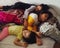 Asian children siblings sleeping together. Deep sleep resting from an active day