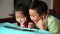 Asian children using digital tablet. E-learning concept.
