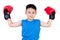 Asian Chinese boy wearing boxing gloves with victory